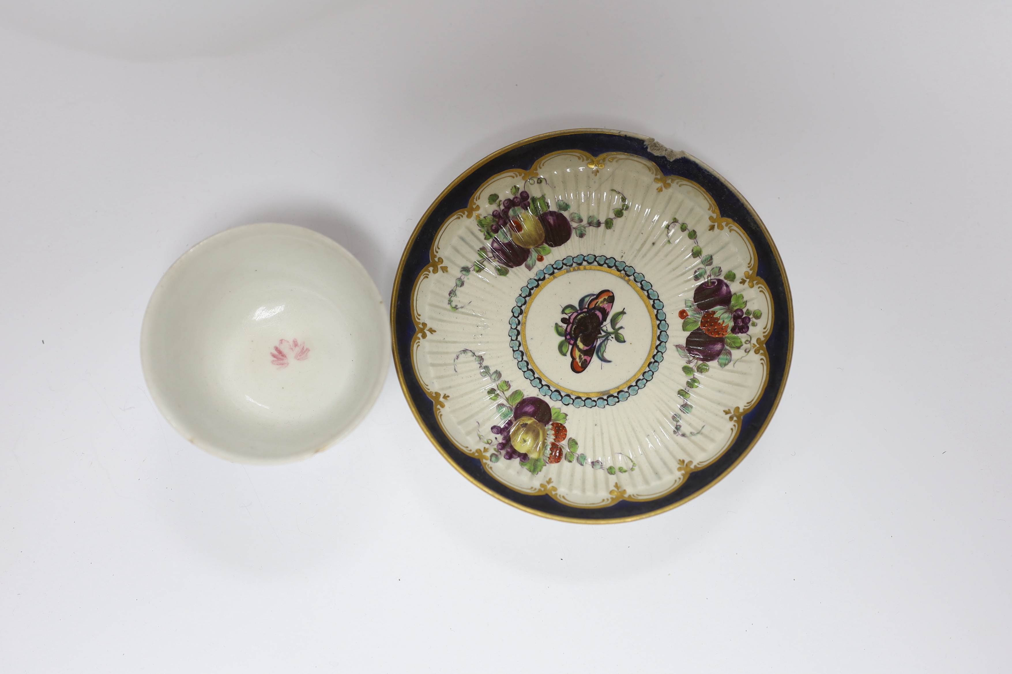 A pair of Samson Worcester style scale blue dishes, a Worcester fruit painted tea bowl and saucer, c.1780 and another teabowl together with a pair of Derby armorial plates, c.1820 and two jugs